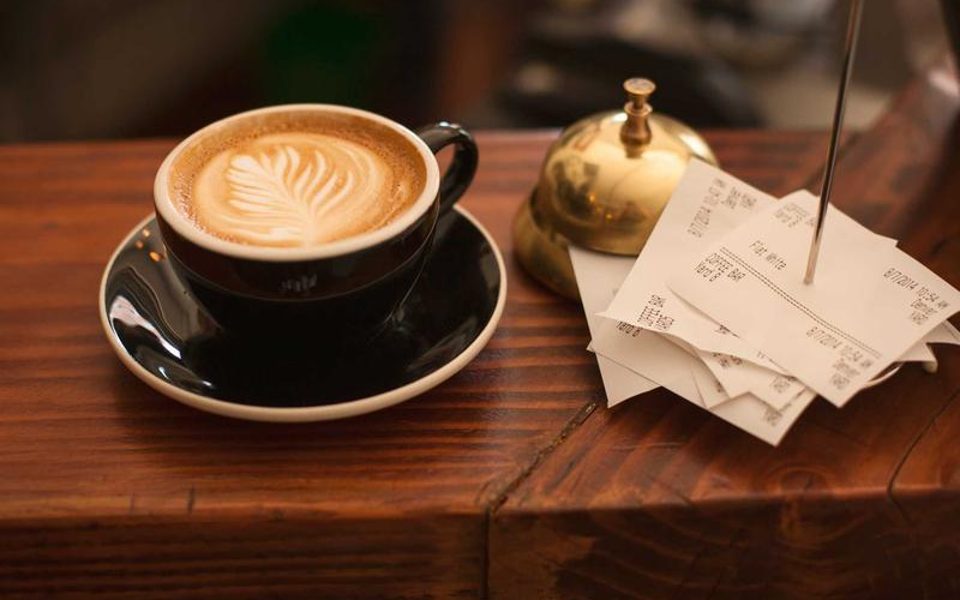 A cup of coffee on a table